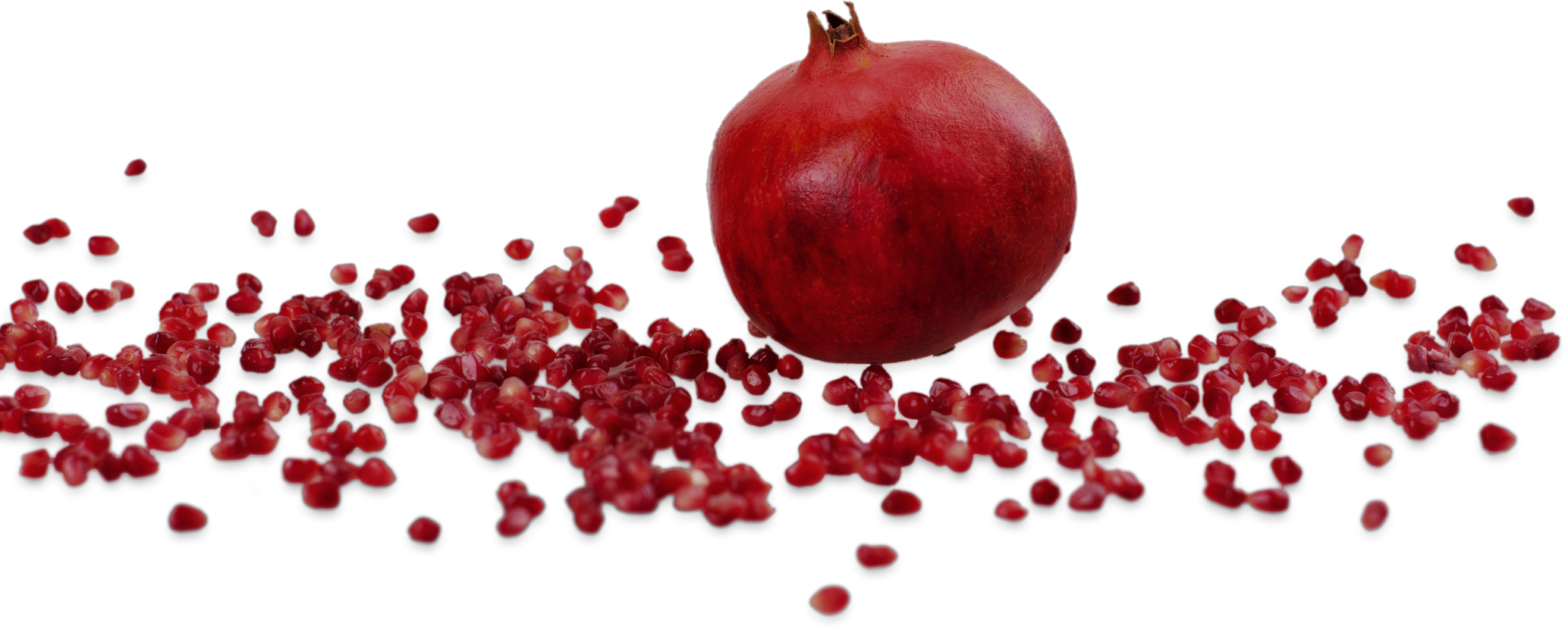 Pomegranite with Scattered Seeds